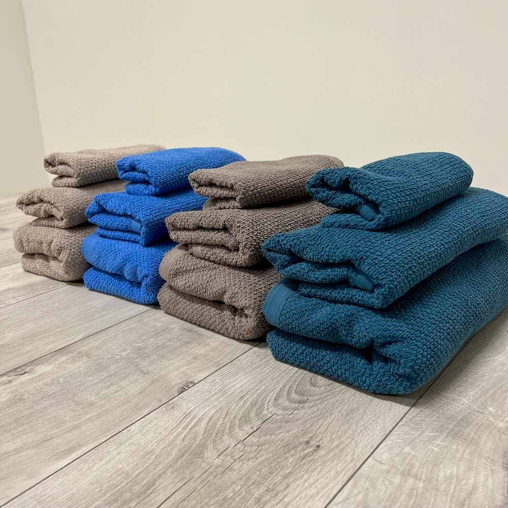 Coppia asciugamani chicco di riso blu