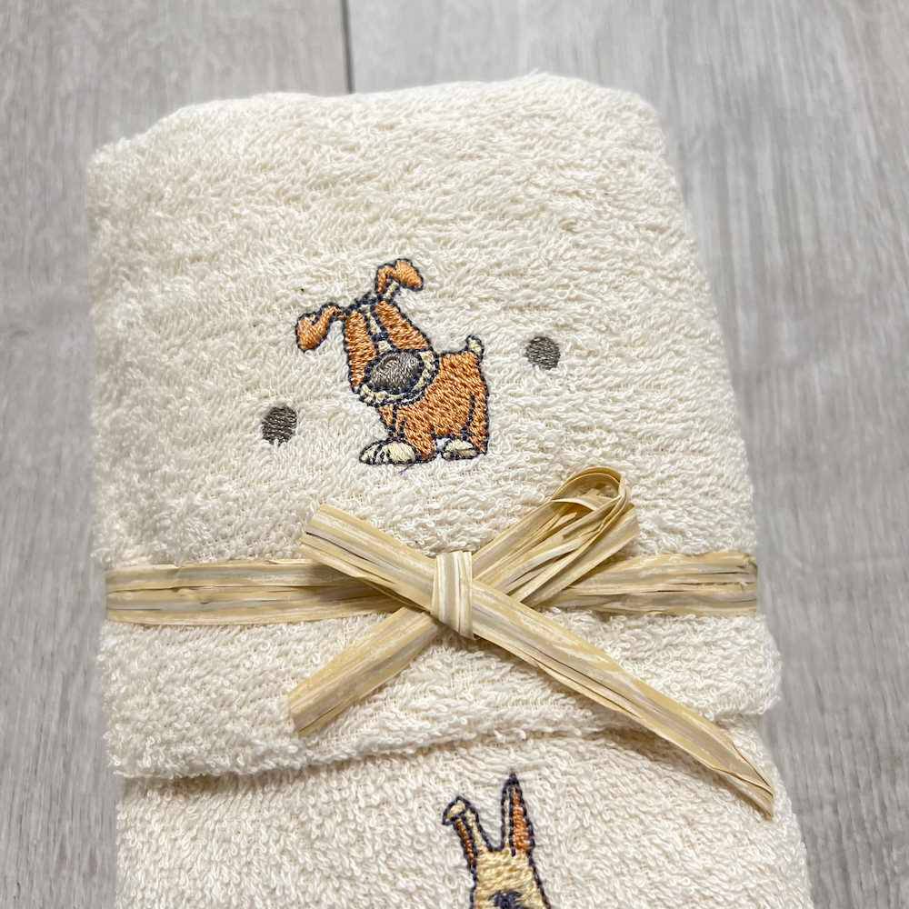 Coppia asciugamani cagnolini ricamati panna