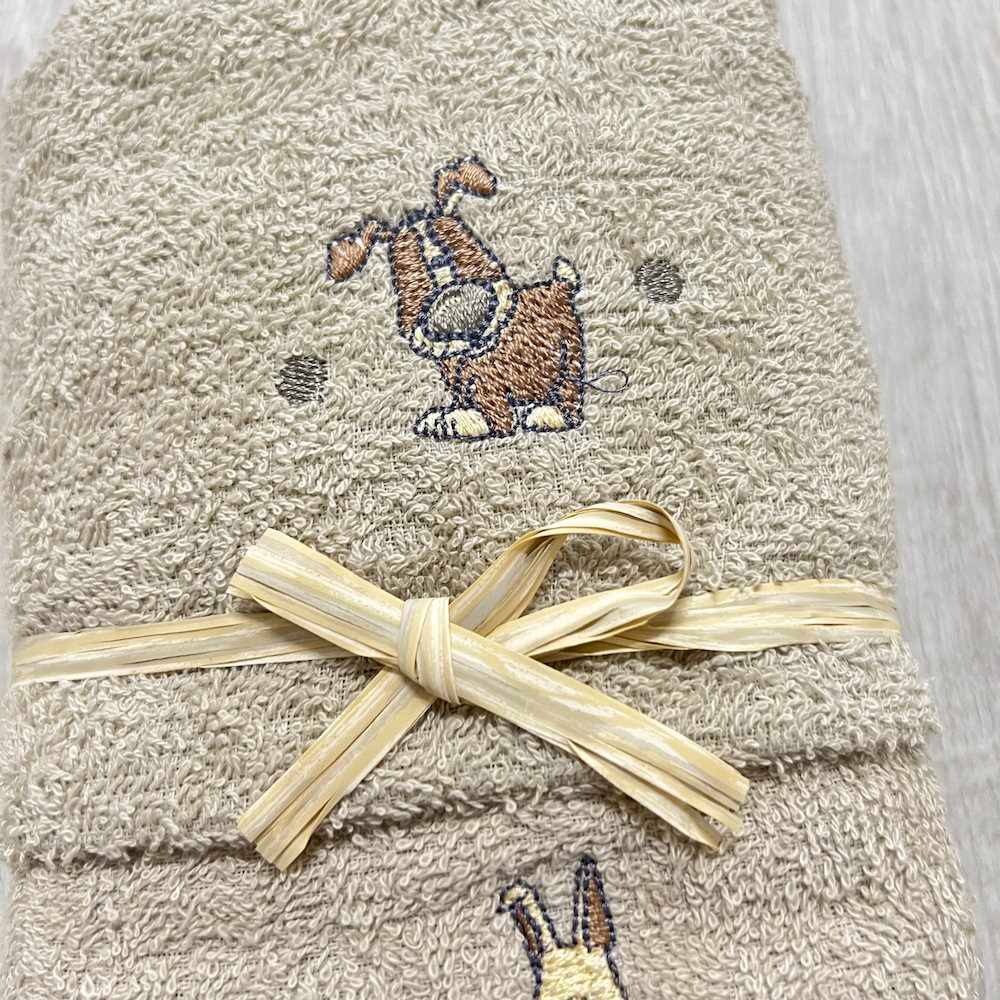 Coppia asciugamani cagnolini ricamati tortora