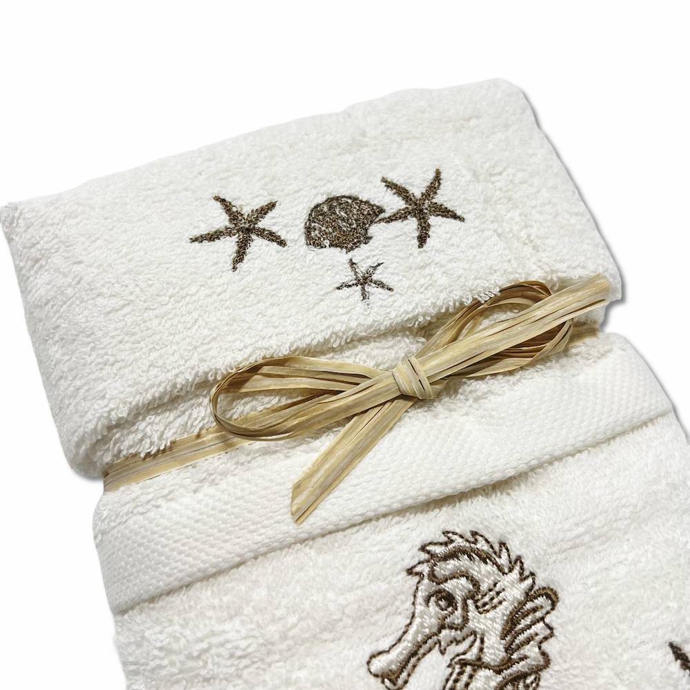 Coppia asciugamani ricamati cavallucci marini tortora fondo panna