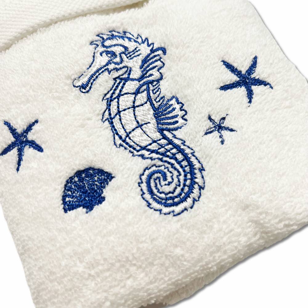 Coppia asciugamani ricamati cavallucci marini blu fondo bianco